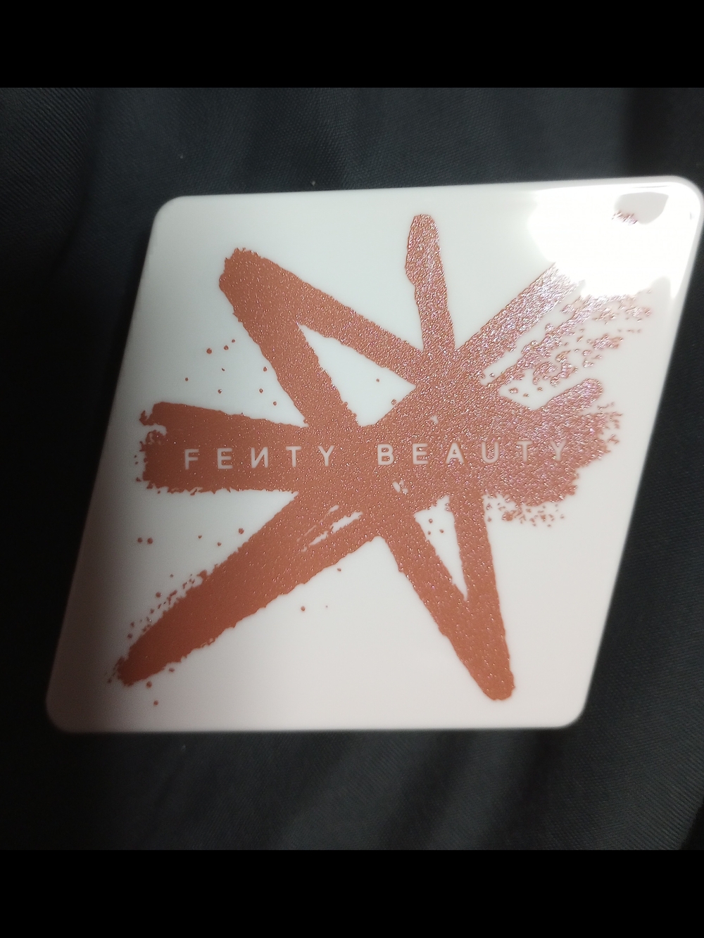Fenty Beauty White Compact with Rose Gold Star Graphic